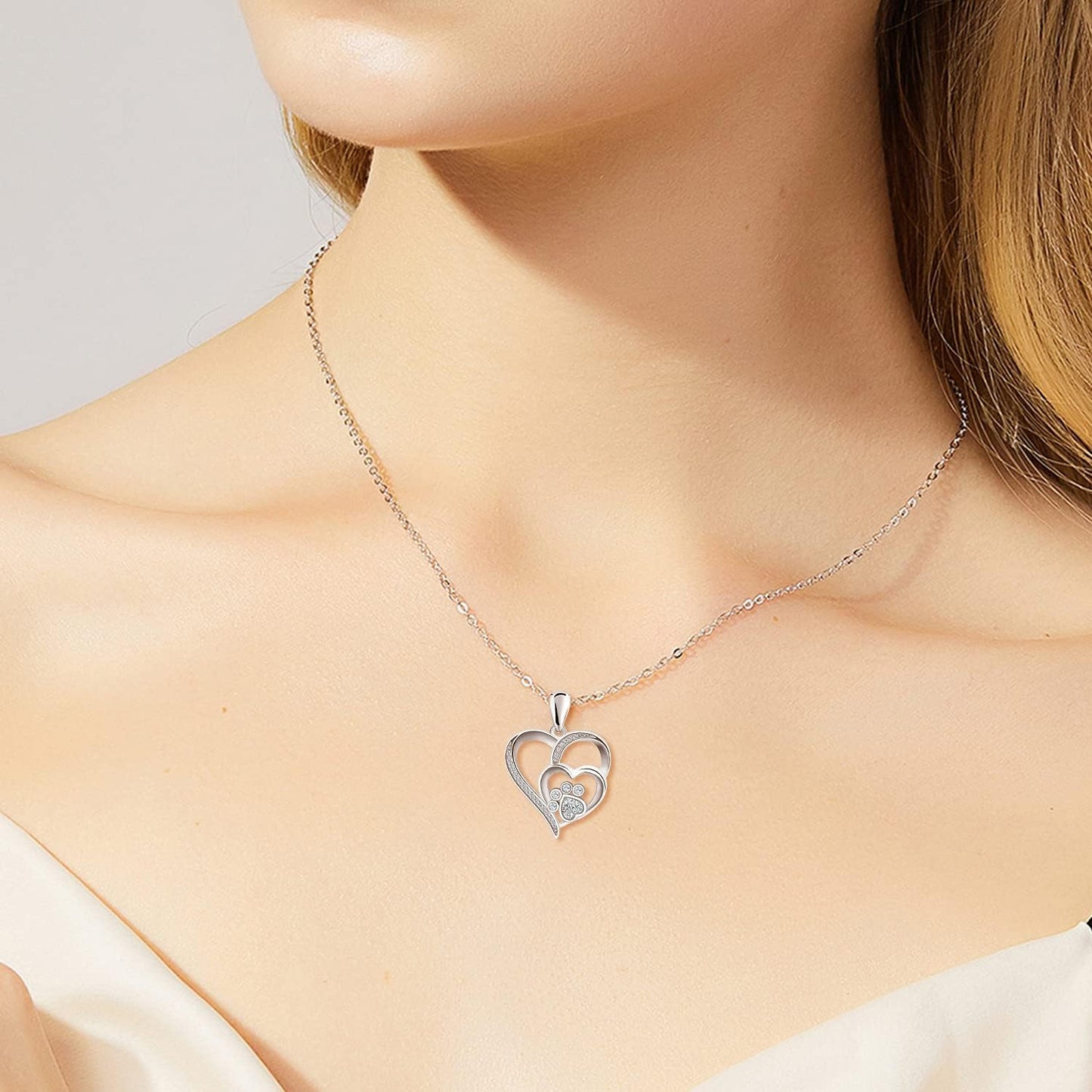 Inolt™ | Collar de pata y corazón en plata