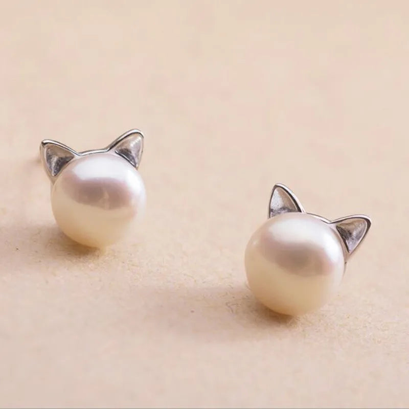 Pendientes de perlas de gato en plata de ley