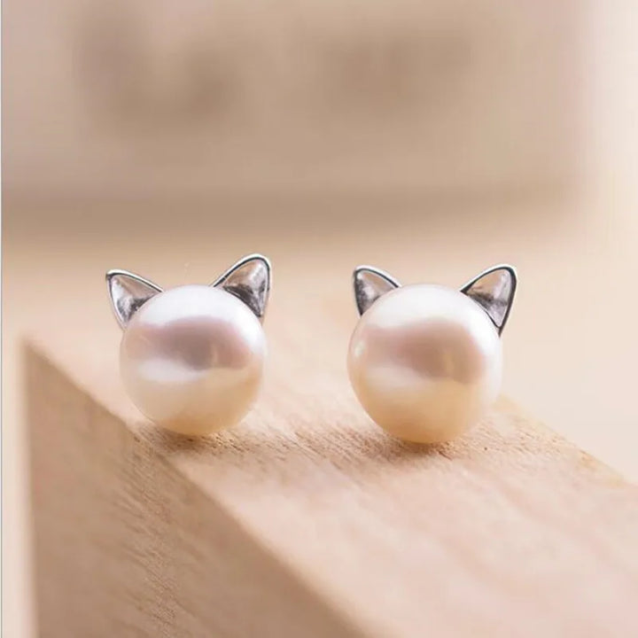 Pendientes de perlas de gato en plata de ley